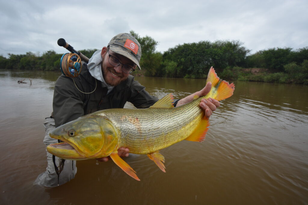 Mike Komara with an Argentinian Dorado caught fly fishing