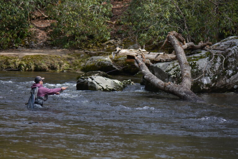 Mike Komara fly fishing in a competition for fly fishing team usa