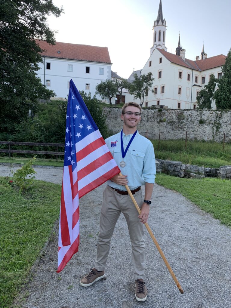 Mike Komara with a silver medal at the Youth World Championships