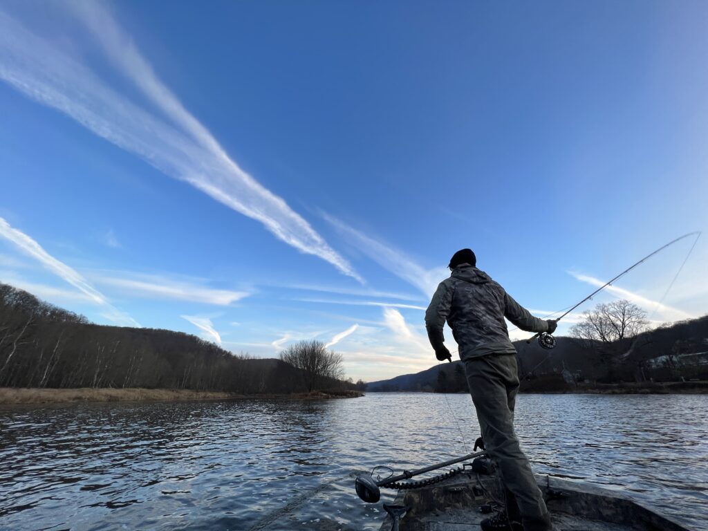 An angler casting a fly on the Juniata river