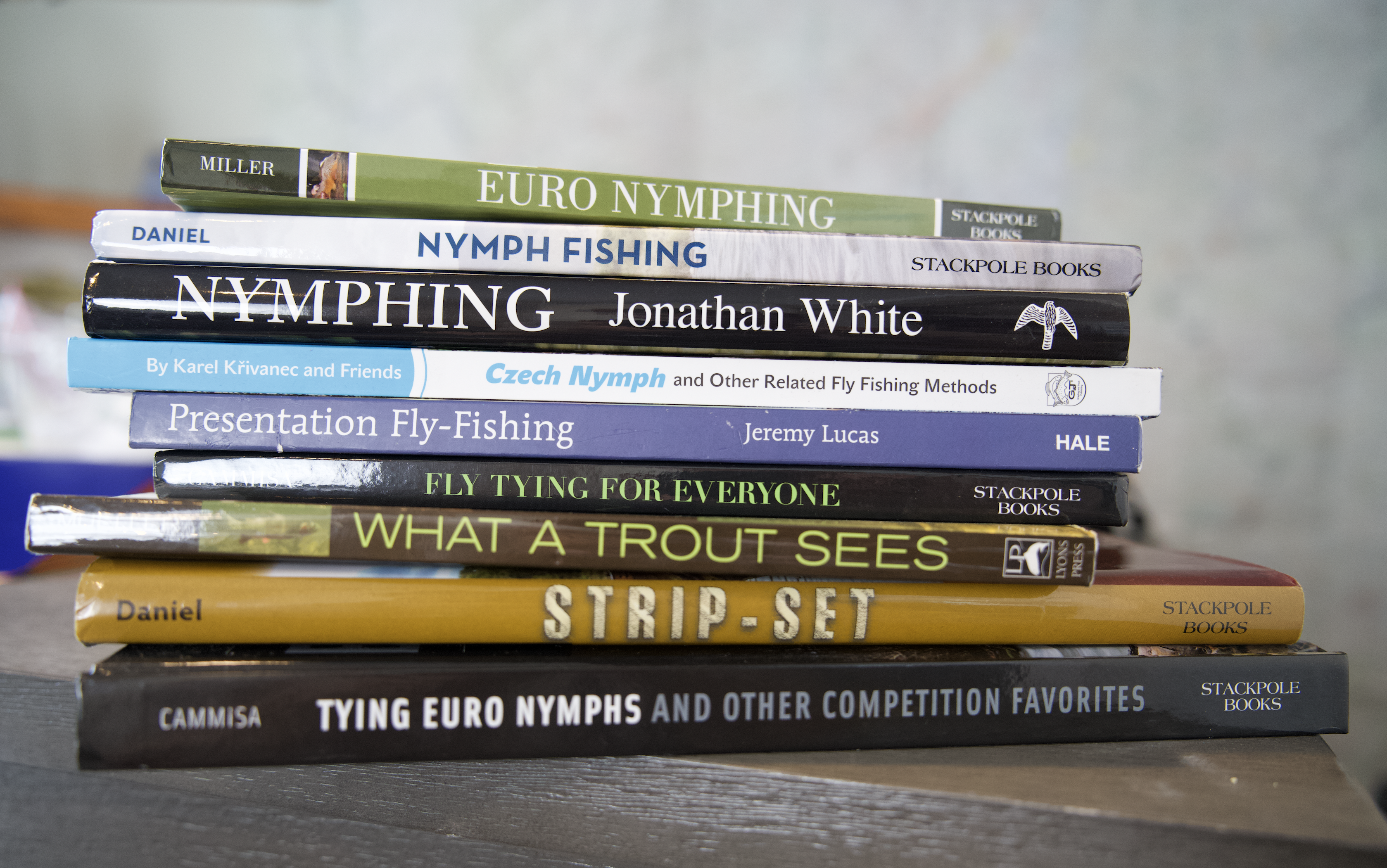 A stack of fly fishing books