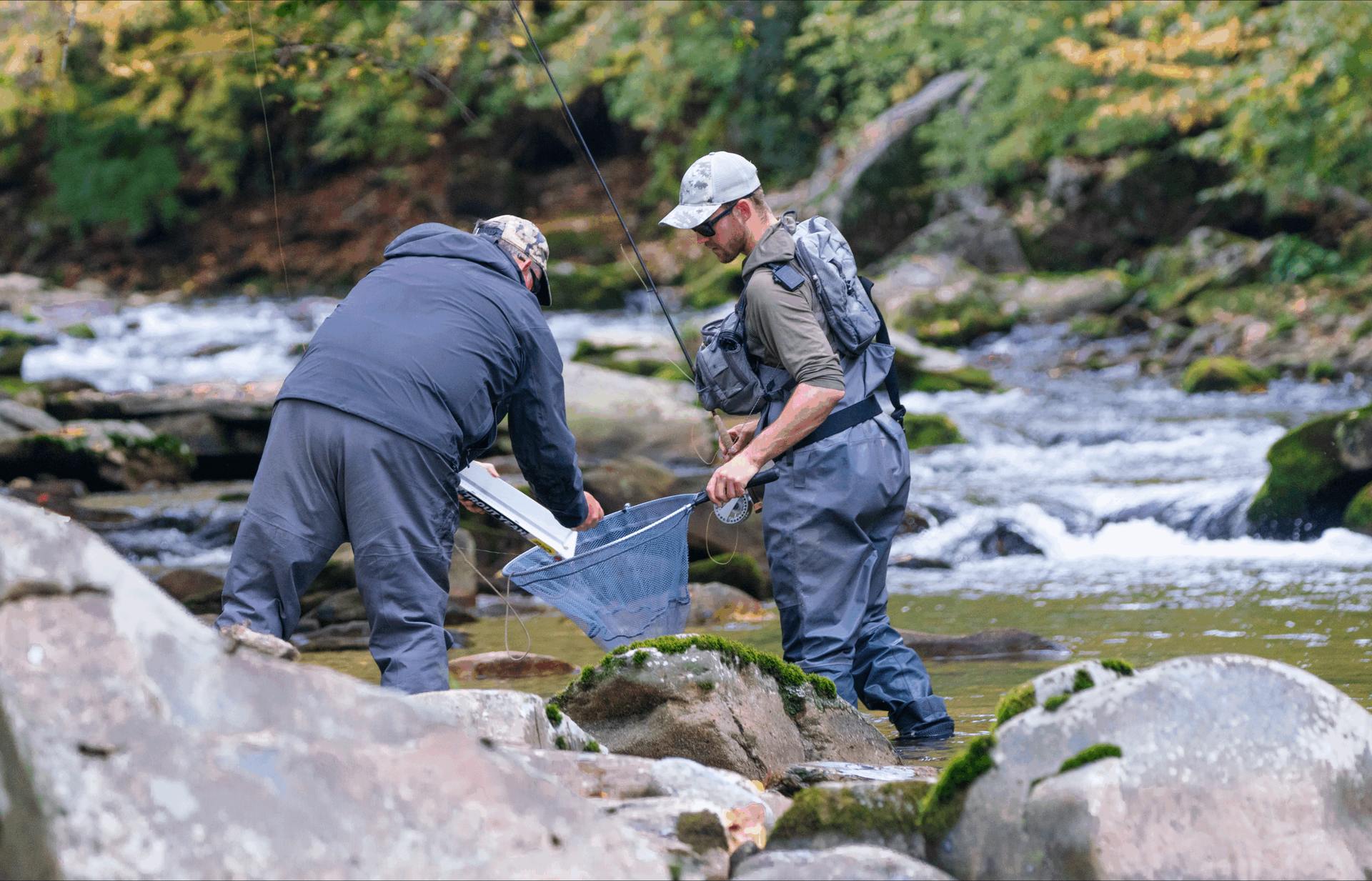 An angler scoring a fish at a Team USA Fly Fishing Event