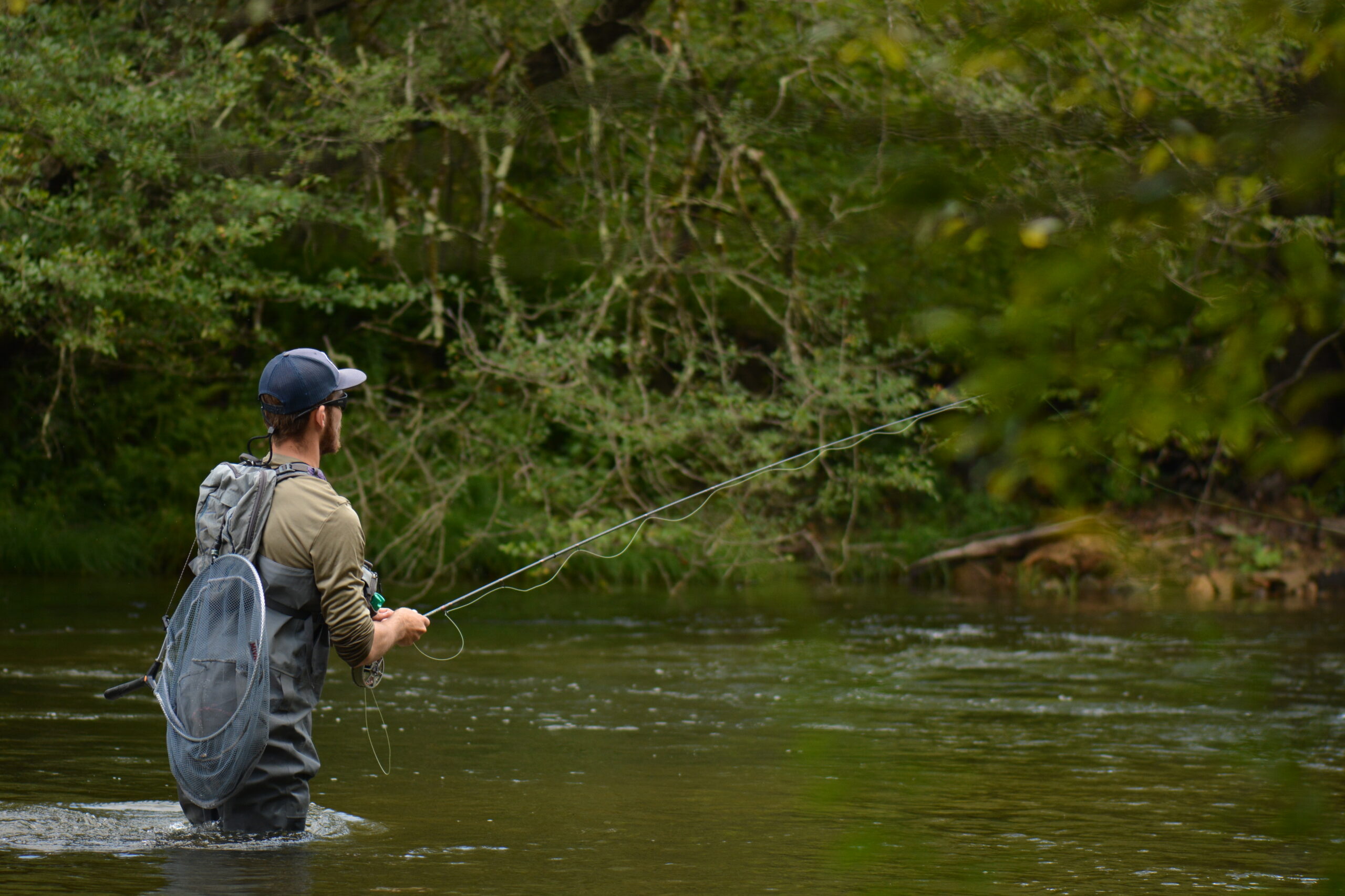 An angler nymphing a Pennsylvania river